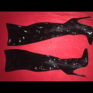 Thigh high shiny leather boots